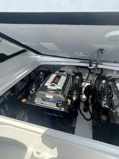  Yacht Photos Pics 2025 Formula 290 Bowrider engine compartment with dual engines.
