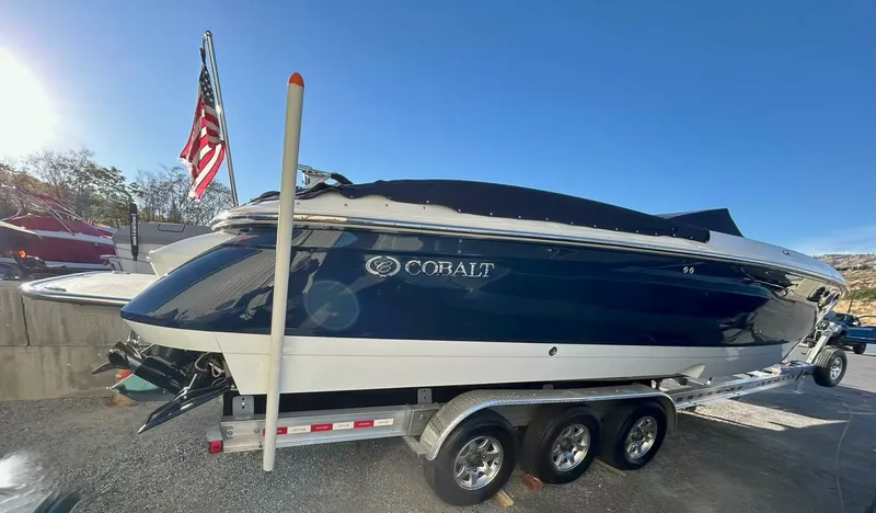  Yacht Photos Pics 2005 Cobalt 343 boat on trailer with American flag in background.