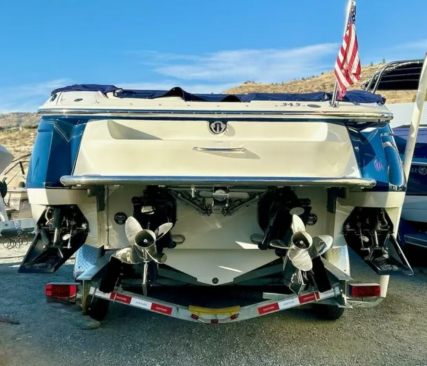 Yacht Photos Pics 2005 Cobalt 343 boat on trailer with dual propellers and American flag.