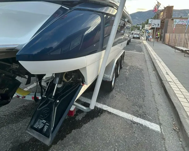  Yacht Photos Pics 2005 Cobalt 343 boat on trailer, parked on street, rear view.