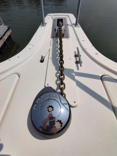 Reel Time Yacht Photos Pics Bow of 2005 Rampage 38 Express with anchor chain and Maxwell winch.
