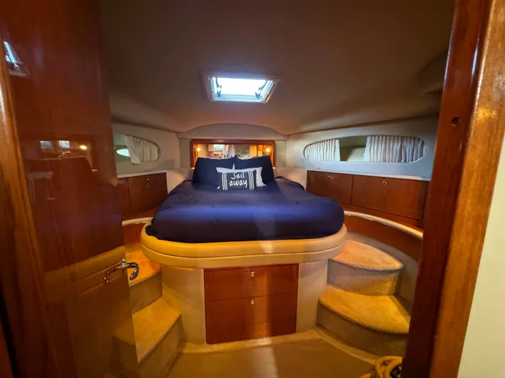 Fathom This Yacht Photos Pics Luxurious cabin interior of 2001 Sea Ray 420 Aft Cabin yacht with cozy bed.