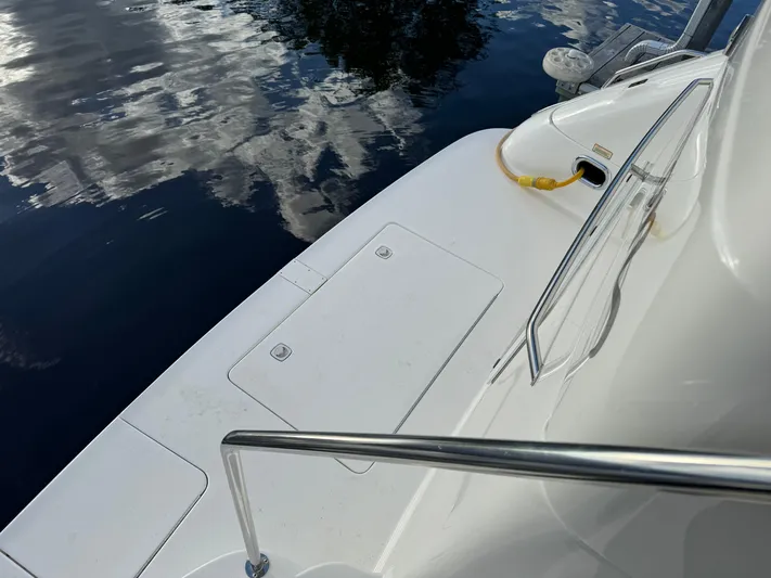Fathom This Yacht Photos Pics 2001 Sea Ray 420 Aft Cabin yacht deck with water reflection.