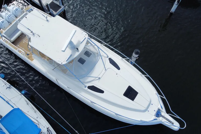  Yacht Photos Pics Aerial view of 2006 Intrepid 377 boat docked in marina.