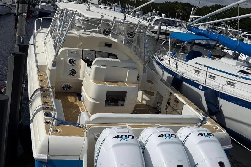  Yacht Photos Pics 2006 Intrepid 377 boat with triple 400R engines docked at marina.