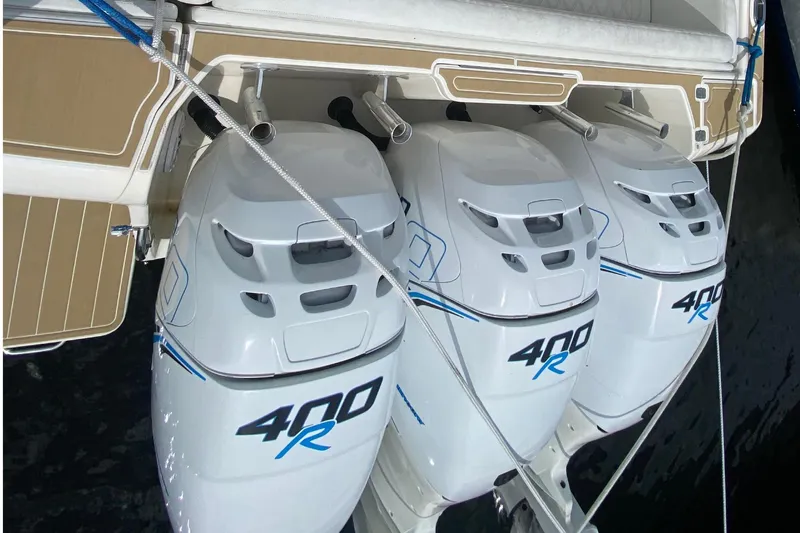  Yacht Photos Pics Triple 400R outboard engines on a 2006 Intrepid 377 boat, docked.