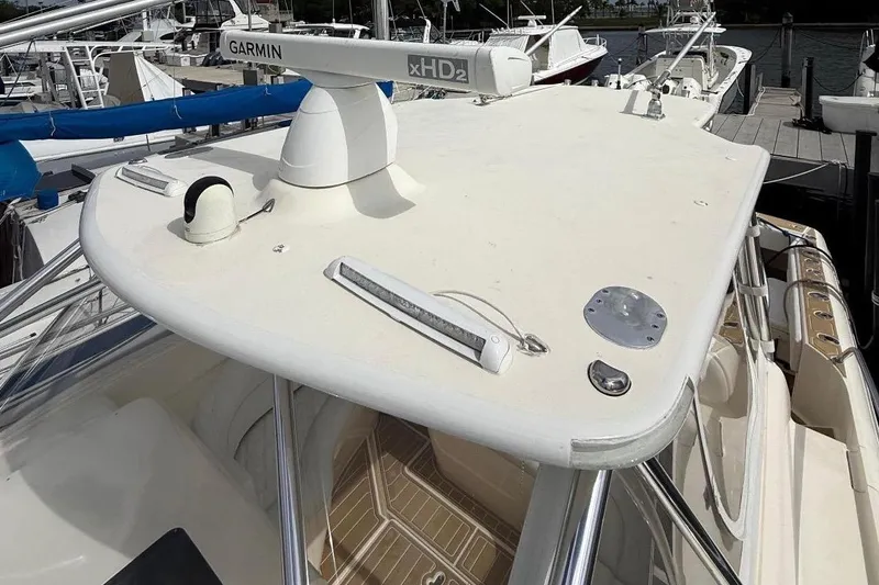  Yacht Photos Pics 2006 Intrepid 377 boat with Garmin xHD2 radar on deck, docked at marina.