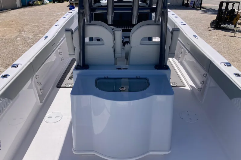 The Grey Ghost Yacht Photos Pics 2026 Twin Vee 280 GFX CC boat interior with seating and storage features.