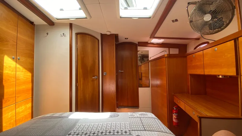  Yacht Photos Pics Interior of 2004 Hanse 531 yacht with wooden cabinetry and skylights.