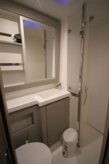 Ruckus Yacht Photos Pics Modern bathroom in 2021 Fountaine Pajot Catamaran Elba 45, featuring sleek design and compact amenities.