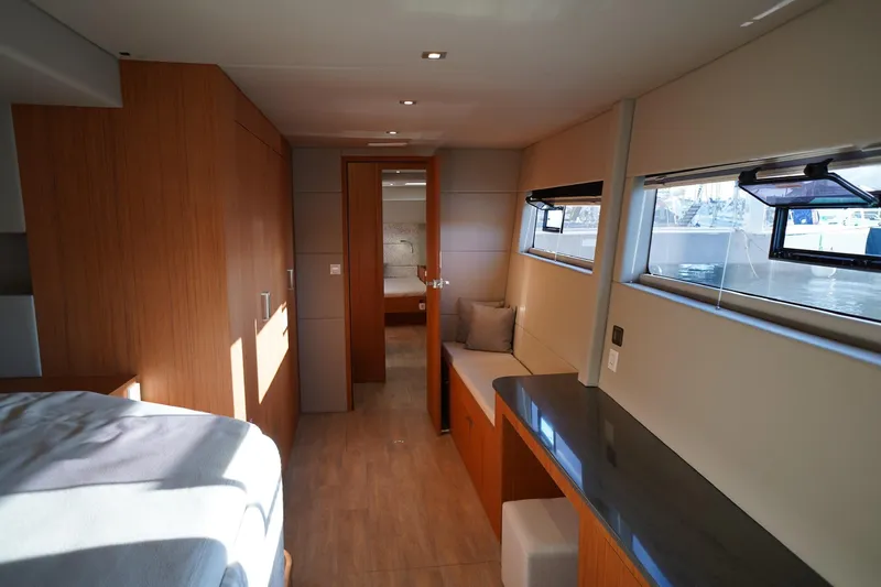 Melissa Yacht Photos Pics Luxurious interior of 2022 Silent 60 yacht with modern wood finishes and ample natural light.