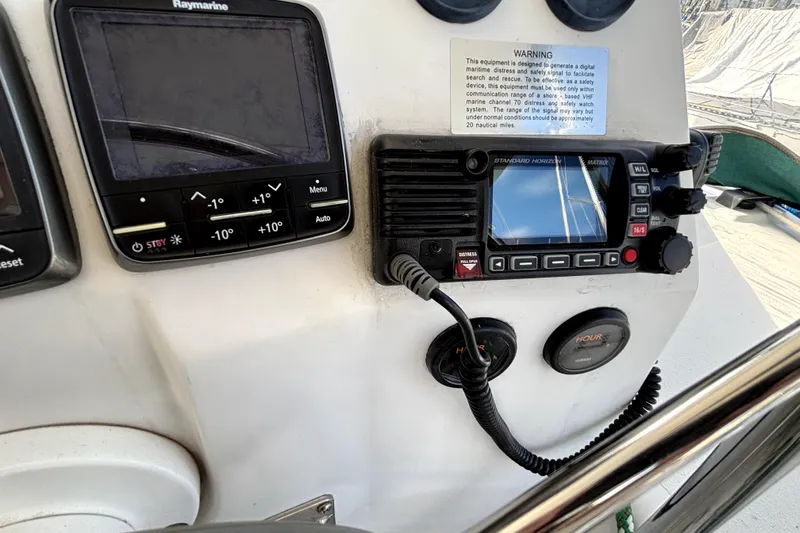 Serenity Yacht Photos Pics Control panel of a 2003 PDQ 36 Capella with navigation and communication equipment.