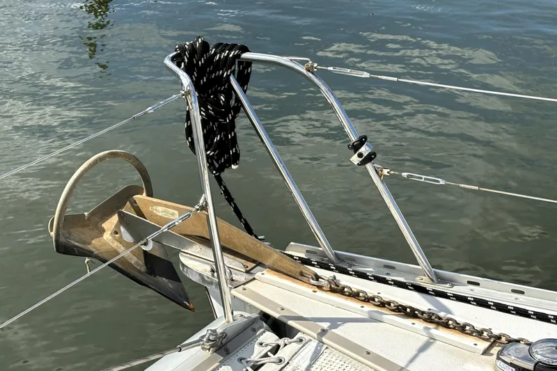 Serenity Yacht Photos Pics Bow of 2003 PDQ 36 Capella sailboat with anchor and ropes.