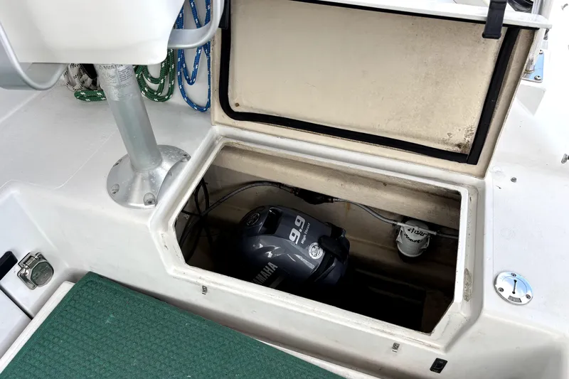 Serenity Yacht Photos Pics Open hatch on 2003 PDQ 36 Capella boat revealing Yamaha engine inside.