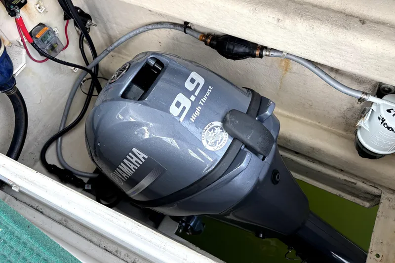 Serenity Yacht Photos Pics Yamaha 9.9 High Thrust outboard motor in PDQ 36 Capella, 2003 model.