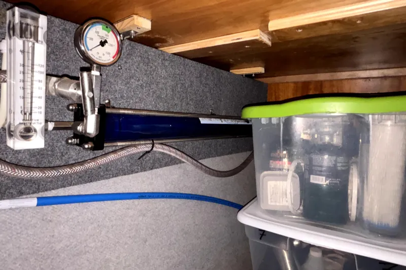 Serenity Yacht Photos Pics Pressure gauge and storage containers inside a 2003 PDQ 36 Capella boat.