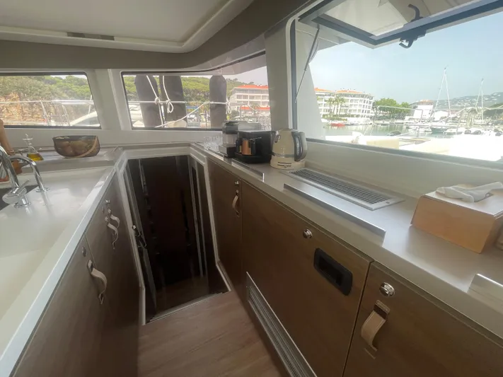  Yacht Photos Pics Modern kitchen interior on 2023 Bali 5.4 yacht, featuring sleek countertops and appliances.