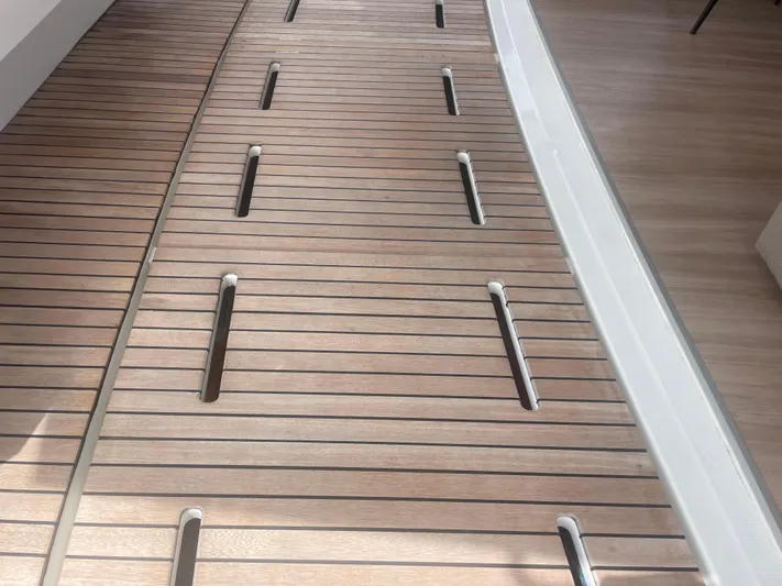  Yacht Photos Pics Teak deck of 2023 Bali 5.4 yacht, featuring sleek design and modern finish.