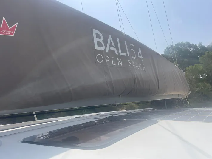  Yacht Photos Pics Sail of a 2023 Bali 5.4 catamaran with "Open Space" branding.