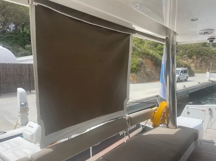  Yacht Photos Pics Bali 5.4 yacht with sunshade, docked at marina, 2023 model.