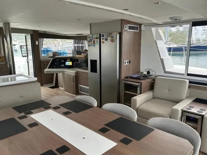  Yacht Photos Pics Luxurious interior of 2023 Bali 5.4 yacht with modern furnishings and large windows.