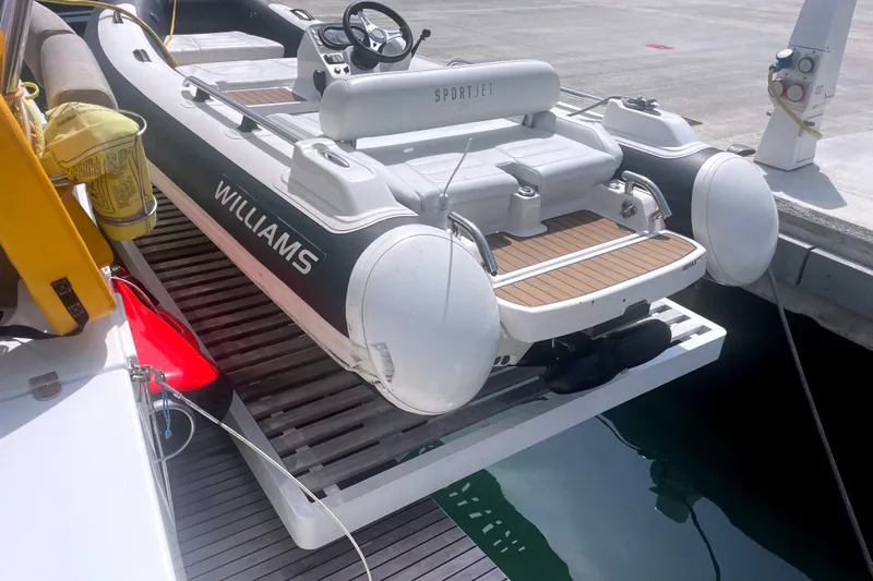  Yacht Photos Pics Inflatable boat docked, featuring Williams branding, Bali 5.4 model, 2023.