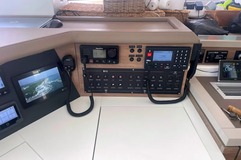  Yacht Photos Pics Control panel of a 2023 Bali 5.4 yacht with navigation and communication equipment.