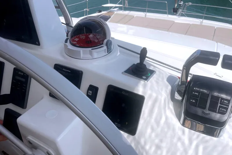  Yacht Photos Pics Helm of 2023 Bali 5.4 yacht with navigation controls and compass.