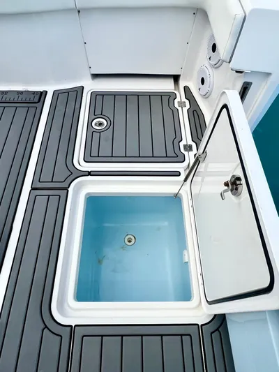 Lia Rose Yacht Photos Pics Open storage compartment on 2022 Invincible 46 Catamaran deck.