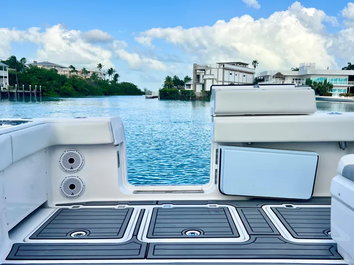 Lia Rose Yacht Photos Pics Invincible 46 Catamaran 2022 on serene waterway with modern deck and scenic view.