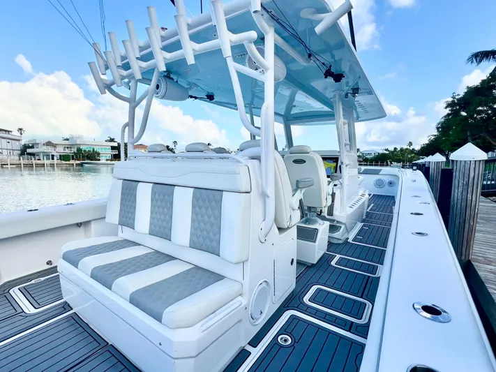 Lia Rose Yacht Photos Pics Invincible 46 Catamaran 2022 with sleek seating and modern design on a sunny day.