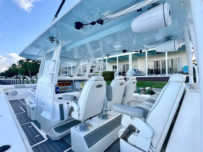 Lia Rose Yacht Photos Pics Invincible 46 Catamaran 2022 interior with modern seating and control panel.