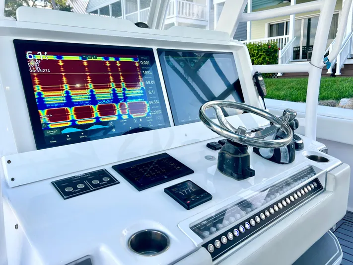 Lia Rose Yacht Photos Pics Invincible 46 Catamaran 2022 dashboard with advanced navigation screens and controls.