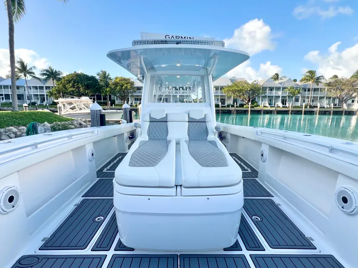 Lia Rose Yacht Photos Pics Invincible 46 Catamaran 2022, luxury deck view, waterfront setting, clear skies.