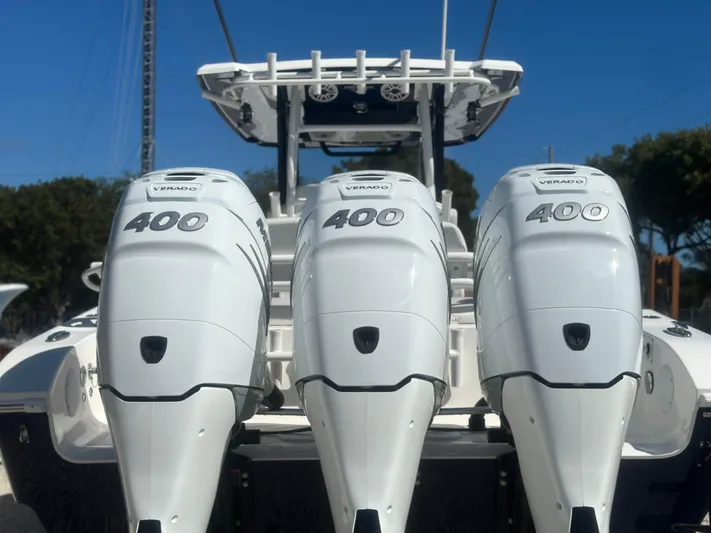  Yacht Photos Pics 2023 Fountain 38 CC boat with triple 400 horsepower engines, rear view.