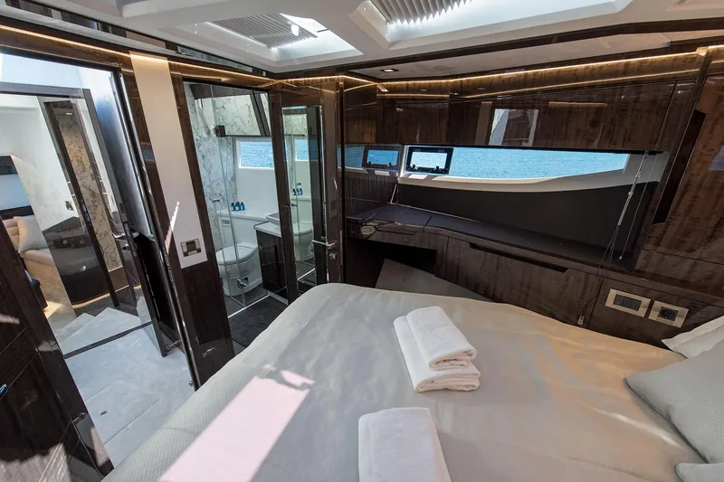  Yacht Photos Pics Luxurious interior of 2023 Galeon 500 Fly yacht with elegant bedroom and sea view.
