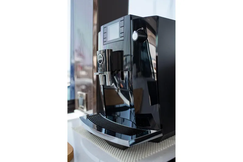  Yacht Photos Pics Modern black coffee machine on Galeon 500 Fly yacht, 2023 model.