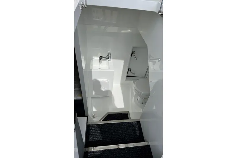  Yacht Photos Pics 2023 Galeon 500 Fly yacht bathroom interior with modern fixtures and sleek design.