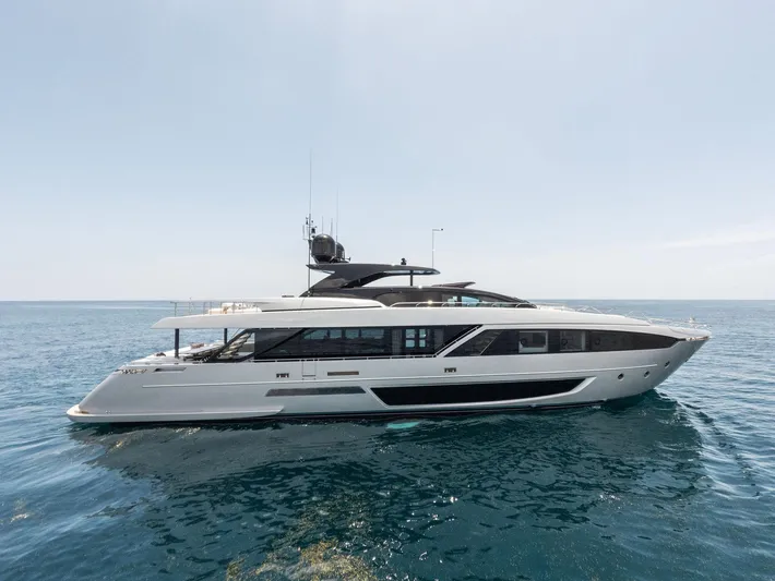 Chop Chop Yacht Photos Pics 2023 Riva Dolcevita yacht on calm ocean waters.