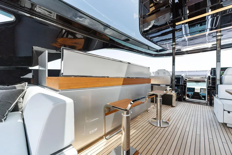 Chop Chop Yacht Photos Pics Luxurious interior of 2023 Riva Dolcevita yacht with sleek design and modern furnishings.
