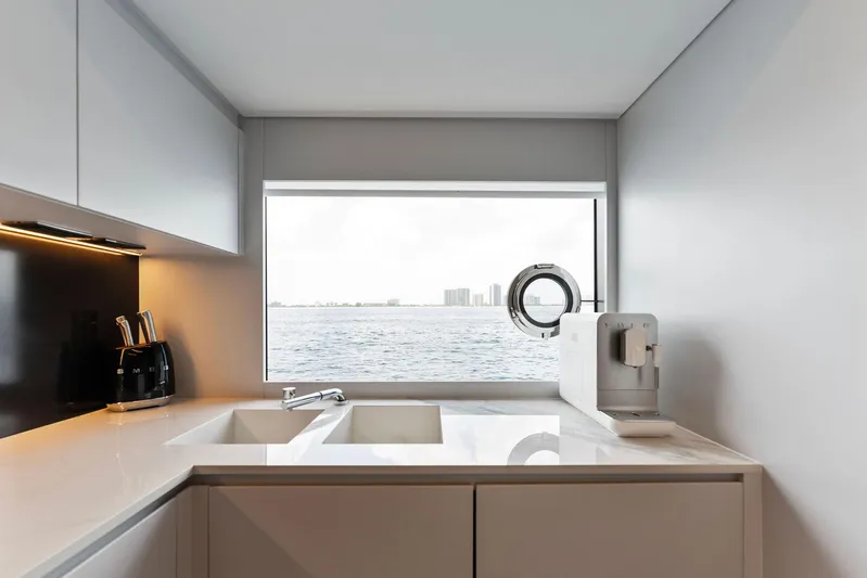 Chop Chop Yacht Photos Pics Modern kitchen interior on 2023 Riva Dolcevita yacht with ocean view.
