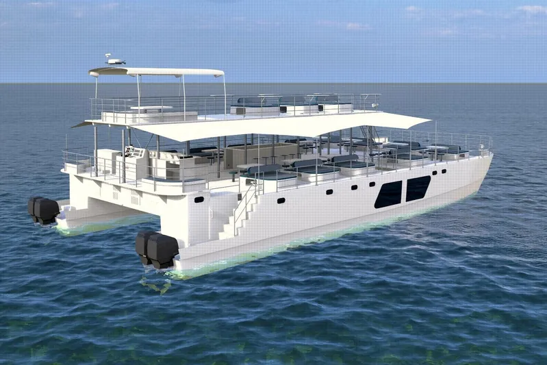  Yacht Photos Pics Futuristic 2027 Custom PAXCAT catamaran on open sea, featuring modern design and spacious decks.
