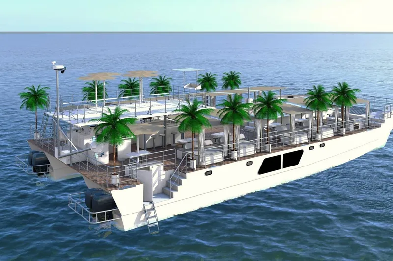  Yacht Photos Pics Custom PAXCAT 2027 luxury catamaran with palm trees and seating on open water.