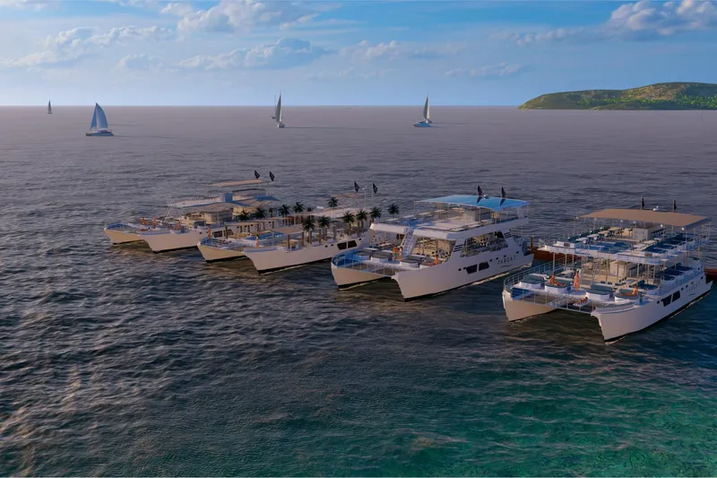  Yacht Photos Pics Four futuristic PAXCAT catamarans sailing on a serene ocean, 2027 model.