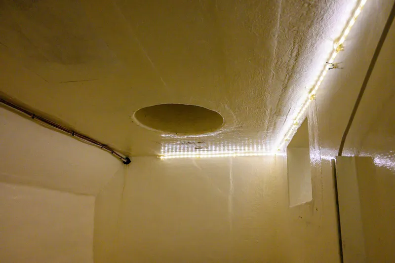 Starlight Yacht Photos Pics Interior of 1986 Custom Expedition Vessel 58 with LED lighting and ceiling details.