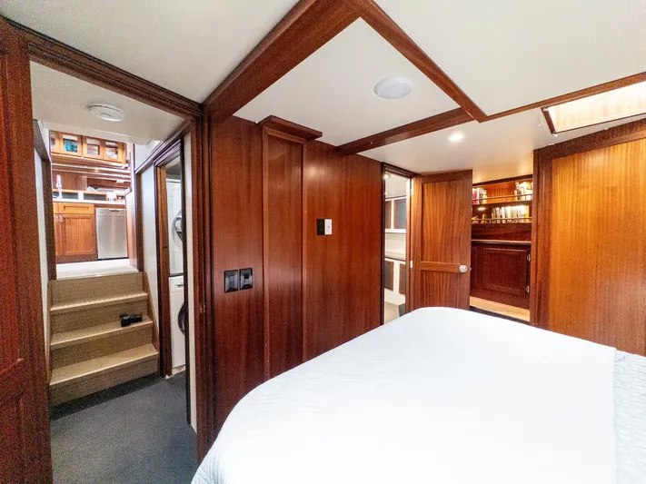Starlight Yacht Photos Pics Luxurious interior of 1986 Custom Expedition Vessel 58 with wood paneling and modern amenities.