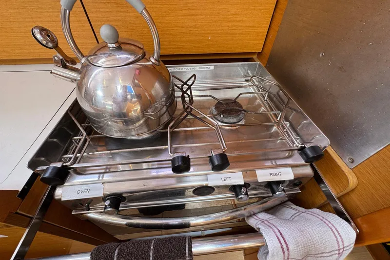 Layover Yacht Photos Pics Stainless steel kettle on Jeanneau Sun Odyssey 389 stove, 2018 model.