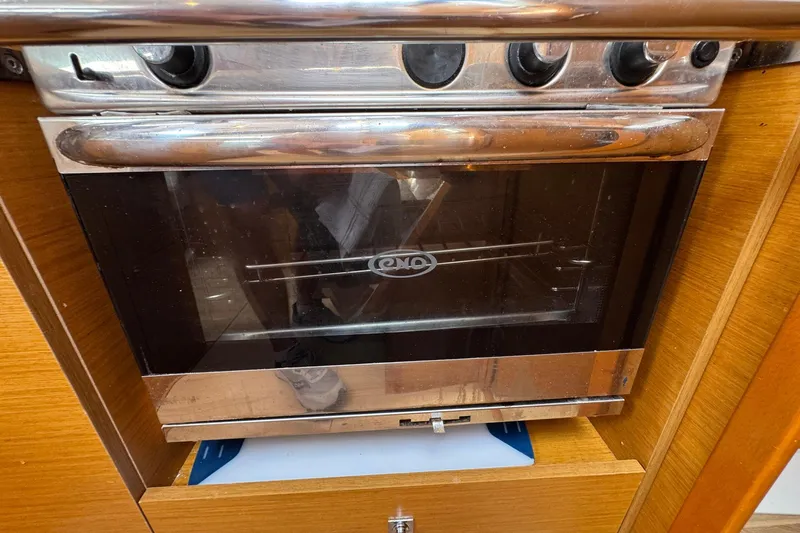 Layover Yacht Photos Pics Stainless steel oven in 2018 Jeanneau Sun Odyssey 389 yacht kitchen.