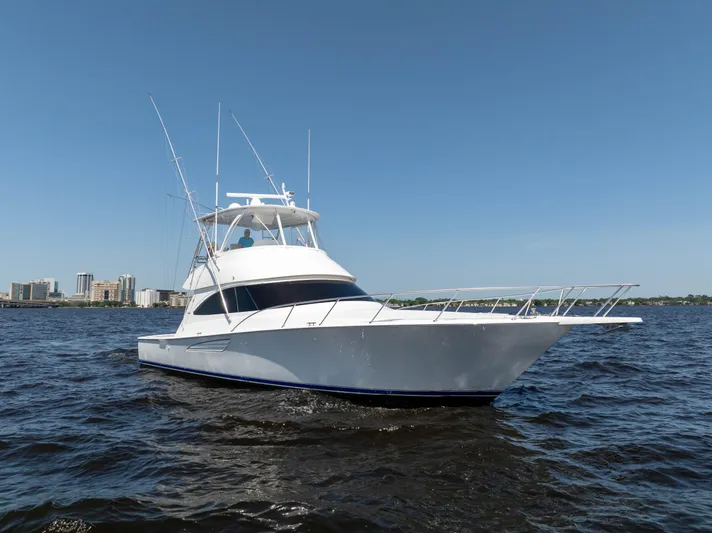 Time Away Yacht Photos Pics 2019 Viking 48 Convertible yacht on open water, clear sky background.