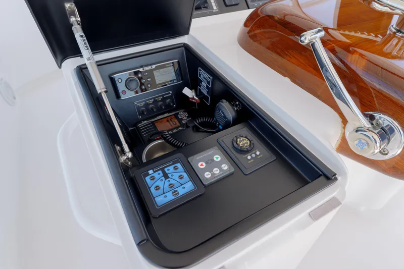 Time Away Yacht Photos Pics Control panel of a 2019 Viking 48 Convertible yacht with navigation and communication equipment.